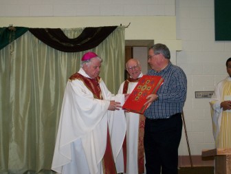 Bishop John D’Arcy was given the St. Mother Theodore Guérin award this year at the Catechetical Institute Day and was presented with a beautiful book of Gospels.