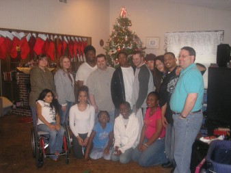 Angel in Adoption award winners Theresa and Mike Teders’ family of three biological and 13 adopted children include in front from left Jessica, Shawna, Javani, Jasmine and Kaneshia. In back are Amanda, Kristina, Matthew, Cameron, Joe, Jon, Steven, Joshua, David and Mike Jr. Two children, Richie, who died in 1988, and Derrick, who is in North Carolina, are not shown.