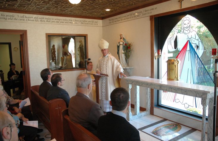 Bishop dedicates altar, blesses Divine Mercy Chapel