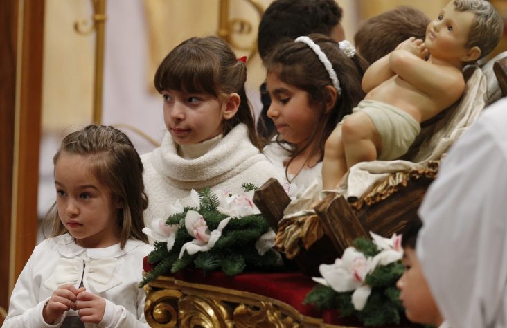 On Christmas, pope urges people to hear the cry of suffering children