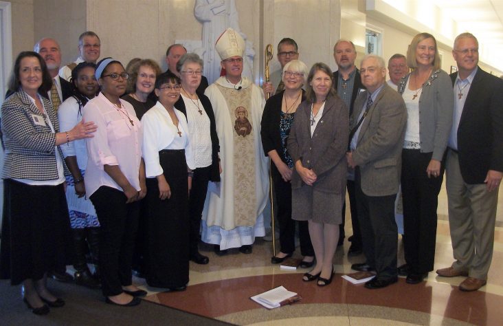 Fourteen profess vows to third order of Franciscans