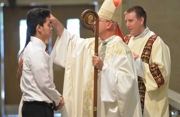 100 adults receive confirmation in Fort Wayne, South Bend