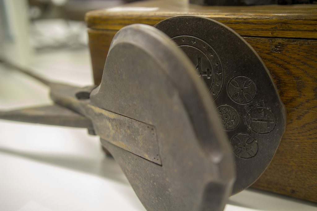 Communion bread makers on display at museum - Today's Catholic