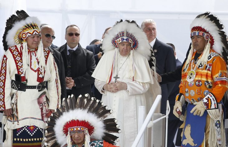 Returning moccasins, pope apologizes for church role in residential schools