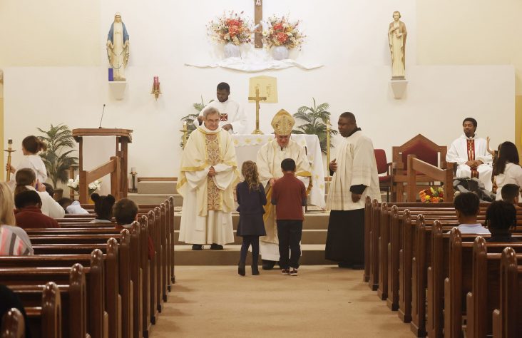 Saints and Scholars Welcome Bishop Rhoades for Pastoral Visit