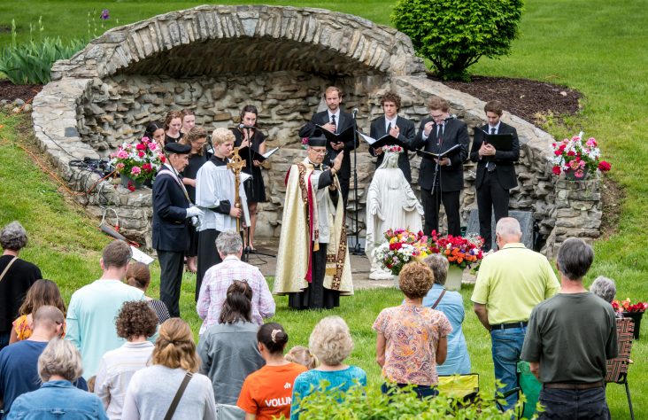 Faithful Gather to Honor Blessed Mother and All Mothers at Catholic Cemetery